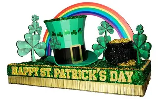 St. Patrick's Day parade float with rainbow shamrocks and leprechaun hat