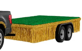 Trailer float with green turf platform and gold fringe skirting