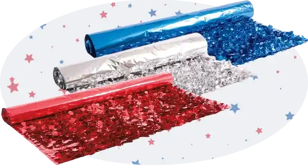 Rolls of metallic parade fringe in red, silver, and blue, displayed unrolled to show reflective texture and color.